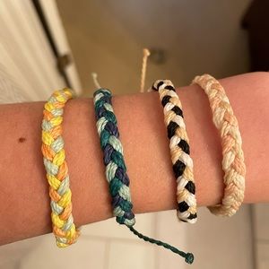 4 multi colored braided bracelets